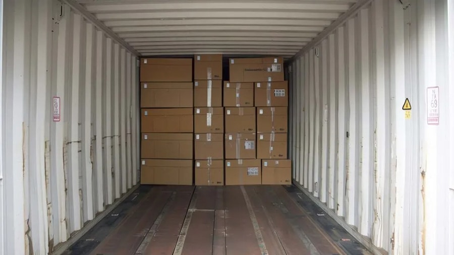 Twenty foot container loading arrangement showing palletized brake pads for 2005 Chrysler Town and Country wholesale distribution